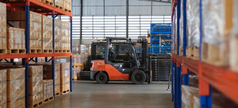 warehouse forklift representing inventory optimization