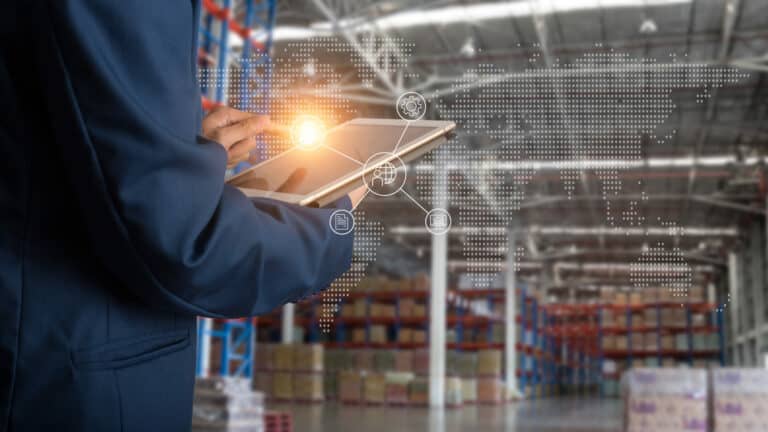 Logistic and transport concept : Businessman manager using tablet check and control and planning for Modern Trade warehouse